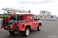 Turweston Aerodrome Airport, Turweston, England United Kingdom (EGBT) - The Fire Rescue Landrover at Turweston airfield with the temporary 'portacabin' ATC and Cafe accommodation in the background. - by Clive Pattle
