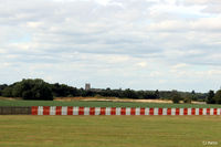 RAF Coningsby Airport, Coningsby, England United Kingdom (EGXC) - Airfield view RAF Coningsby EGXC showing the threshold fencing. - by Clive Pattle