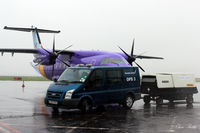 Dundee Airport, Dundee, Scotland United Kingdom (EGPN) - Ramp activity at a very wet and overcast Dundee Riverside Airport EGPN - by Clive Pattle