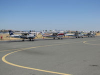 Buchanan Field Airport (CCR) - Another shot of the 2014 Air Race Classic flightline showing Embry-Riddle Prescott Cessna 172S N546ER #4, Cessna 182T N6038V #3, U of ND Cessna 172S N608ND #2 & Cessna 172M C-GWTJ #1 - by Steve Nation