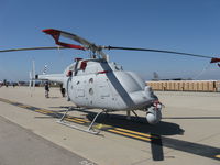 Point Mugu Nas (naval Base Ventura Co) Airport (NTD) - BUNO 168810 Northrop Grumman MQ-8C FIRE SCOUT UAS based on Bell 407 with longer range & payload than MQ-8B. Rolls Royce 250-C47E Turboshaft with dual channel FADEC, speed 135 kts, ceiling 16,000', range 1,227 nmi/12 hrs. Closeup - by Doug Robertson