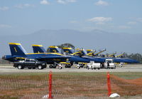 Point Mugu Nas (naval Base Ventura Co) Airport (NTD) - Five Blue Angels F/A-18C Hornets single seat with one F/A-18D Hornet dual seat (Tail #7) aligned on display-practice day for the weekend airshow at NTD. Two General Electric F404-GE-402 turbofans. Max speed Mach 1.8 - by Doug Robertson