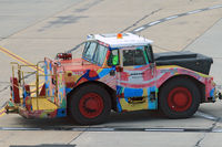 Melbourne International Airport - very colourful Melbourne tug - by Bill Mallinson