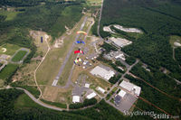 Turners Falls Airport (0B5) - Skydivers over Turners Falls, MA. - by Dave G