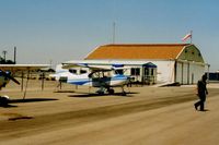 Los Banos Municipal Airport (LSN) - Good picture of the airport office and large hangar next to it. - by S B J