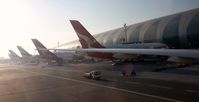 Dubai International Airport, Dubai United Arab Emirates (OMDB) - Pulling into our gate in DXB next to the Wallabies A388 of QF. - by FerryPNL