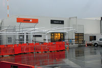 Auckland International Airport, Auckland New Zealand (NZAA) - The new shed at Auckland's domestic part with gates 62 and 63, for the new Jetstar regional prop services - by Micha Lueck