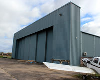 Perth Airport (Scotland), Perth, Scotland United Kingdom (EGPT) - The easternmost hangar at Perth EGPT is occupied by Airwork Service Training (AST). This building houses classrooms and engine and airframe instructional items for the benefit of their multi-national students. - by Clive Pattle