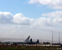 RAF Lossiemouth Airport, Lossiemouth, Scotland United Kingdom (EGQS) - Airport scene at RAF Lossiemouth EGQS  - during Exercise Joint Warrior 16-1. P-8A 168764 and other participants parked up whilst 168763 takes off in the distance. - by Clive Pattle