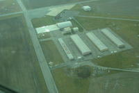 Richmond Municipal Airport (RID) - Flying over to cross midfield for a fuel stop - by Floyd Taber