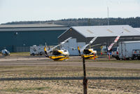 Prince George Airport, Prince George, British Columbia Canada (CYXS) - Just south of main terminal building. Helicopters ready to fight forest fires.  - by Remi Farvacque