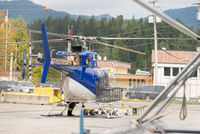 Prince Rupert/Seal Cove Water Airport - Unknown helicopter in general setting of dry-land part of airport. Canadian Coast Guard base in background. - by Remi Farvacque