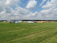 White Waltham Airfield - oldies out on the apron - as well as planes! - by magnaman