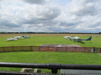 Sleap Airfield Airport, Shrewsbury, England United Kingdom (EGCV) - grass apron in front of tower/cafe - by magnaman