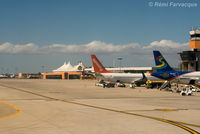 Los Cabos International Airport - View of main parking area in front of terminal building as taxiing for take-off. - by Remi Farvacque