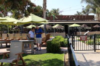 Camarillo Airport (CMA) - The Waypoint Cafe and its patio tables. Eat indoors or out. I have eaten there since the 1980s. - by Doug Robertson