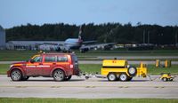 Manchester Airport, Manchester, England United Kingdom (EGCC) - Runway calibration vehicle at Manchester - by Guitarist