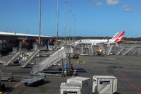 Gold Coast Airport - Lots of stairs at an airport that made a conscious decision not to build any airbridges, and stay with the low cost model... - by Micha Lueck