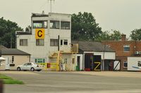 Fairoaks Airport - CONTROL TOWER
'Follow me' Mercedes in front of the building - by Sewell01
