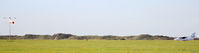 Blackpool International Airport, Blackpool, England United Kingdom (EGNH) - Panoramic shot of the airfield at Blackpool EGNH - the sand dunes show its close proximity to the Irish Sea. - by Clive Pattle