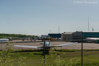 Fort Nelson Airport - View to south from northernmost portion of airport. Privater and corporate hangars. - by Remi Farvacque