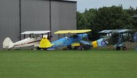 Fowlmere Airport - visiting aircraft parked beside the hangar - by Keith Sowter