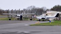 Swansea Airport, Swansea, Wales United Kingdom (EGFH) - Two of Cambrian Flying Club's six aircraft. - by Roger Winser