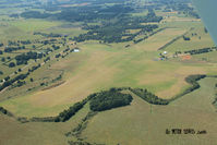 Kaikohe Aerodrome - Large grass airport that sees very little use.

Photo taken from 1000' AGL on climbout from RW17 - by Peter Lewis