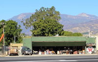 Santa Paula Airport (SZP) - Once Hangar/Home of late actor Steve McQueen and wife; he  taught to fly by SZP's Pete Mason, CFI. Was a fearless student. Location: near Rwy 22. On fund-raising Aviation Museum day. - by Doug Robertson