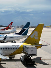 Miami International Airport (MIA) - Very different aircraft at Terminal D - by Tomas Milosch