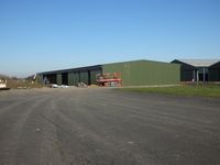 X3TB Airport - Tibenham Airfield Cladding almost finished of the new purpose built glider Hangar - will allow storage of gliders either side - full sliding doors on both sides. - by Keith Sowter