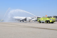 Boise Air Terminal/gowen Fld Airport (BOI) - ARFF giving water salute to aircraft carrying Olympic winners. - by Gerald Howard