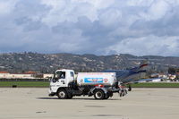 Camarillo Airport (CMA) - Channel Islands Aviation Phillips 66 100LL Fuel Truck, Cessna dealer and FBO since 1976, crossing their ramp. - by Doug Robertson