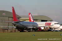 Kemble Airport - Jet2 B737 and TAM A319 being parted out by ASI at Kemble - by Chris Hall