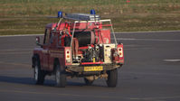 Turweston Aerodrome Airport, Turweston, England United Kingdom (EGBT) - Fire Land Rover going to pick up some FOD from next to the runway - by Adam Loader