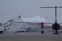 Boise Air Terminal/gowen Fld Airport (BOI) - De ice in progress on the Alaska/Horizon ramp. - by Gerald Howard