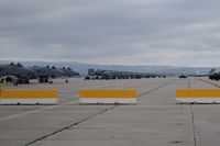 Boise Air Terminal/gowen Fld Airport (BOI) - Idaho ANG's A-10C are all parked with their guns facing away from the runways. Note Air Force One in background. A-10s are normally parked facing the runways. Secret Service didn't trust them. - by Gerald Howard