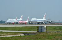 Beijing Capital International Airport - Corrosion corner PEK with a B748 passing behind it. - by FerryPNL