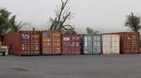 Santa Paula Airport (SZP) - RAY'S Aviation at SZP does good business disassembling/packing aircraft for overseas buyers or receiving bought foreign aircraft for reassembly-uses these Ocean Freight Shipping Containers. - by Doug Robertson