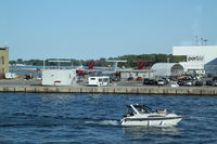Toronto City Centre Airport, Toronto, Ontario Canada (CYTZ) - A view on the parking, from the ferry - by olivier Cortot