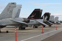 Boise Air Terminal/gowen Fld Airport (BOI) - F/A-18s from VMFAT-101 Sharpshooters and VX-9 Vampires parked on the south GA ramp. - by Gerald Howard