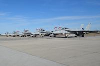 Boise Air Terminal/gowen Fld Airport (BOI) - New F/A-18E from VX-31 Dust Devils parked next to four F/A-18Cs from VMFA-232 Red Devils on the south GA ramp. - by Gerald Howard