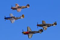 Boise Air Terminal/gowen Fld Airport (BOI) - Local P-40s & P-51s flying during the Gowen Field airshow. - by Gerald Howard