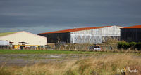 Dunkeswell Aerodrome - Old hangars on north side of Dunkeswell airfield now used as commercial/industrial premises - by Clive Pattle