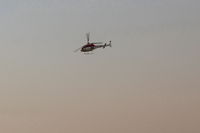 Santa Paula Airport (SZP) - UNKNOWN-N number does not reveal/compute, Thomas Fire firefighting Helicopter, departing SZP fire base. Note smoky sky - by Doug Robertson