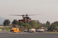 Santa Paula Airport (SZP) - Inbound FireBomber to land SZP Firebase, no registration markings. Note smoky sky. - by Doug Robertson