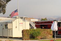 Santa Paula Airport (SZP) - The Thomas Fire SZP Firebase Flag at half-staff honoring the 32 year old fireman and the 70 year old woman who have thus far separately perished in the record-size California wild fire. - by Doug Robertson