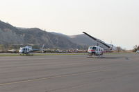 Santa Paula Airport (SZP) - Thomas Fire FireFighting helicopters at SZP Fire HeliBase. N718GH 2001 Eurocopter and CAL-FIRE 902 FireBombers at the ready- - by Doug Robertson