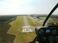 Zwartberg Airport - Landing with R44 00-AAR @ EBZW - by Guy Vandersteen