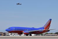 Boise Air Terminal/gowen Fld Airport (BOI) - The Cessna took off a few seconds earlier from 10R, but the Southwest jet on 10L caught up pretty fast. - by Gerald Howard